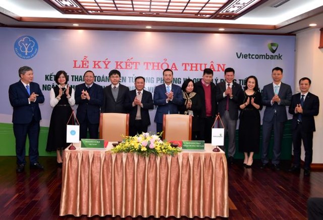 Vietcombank và Bảo hiểm xã hội Viêt Nam hợp tác thanh toán điện tử - Ảnh 1