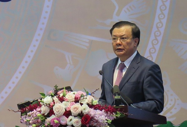Bộ trưởng Bộ T&agrave;i ch&iacute;nh, Chủ tịch Hội đồng Quản l&yacute; BHXH Việt Nam Đinh Tiến Dũng ph&aacute;t biểu tại Hội nghị.