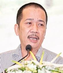 Chuyên gia kinh tế Bùi Trinh.