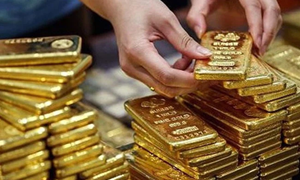 Đồng USD và lợi suất trái phiếu Mỹ giảm, vàng tăng sức hấp dẫn